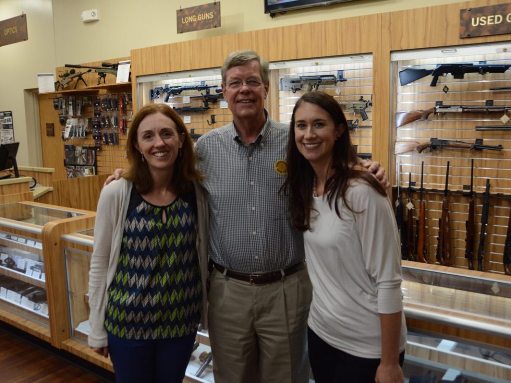 Group photo at the gun shop sized
